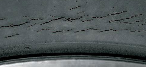 Cracks in the sidewall of the trailer tire should be inspected by tire expert.