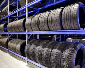 Stack of Car Tires on Warehouse Closeup