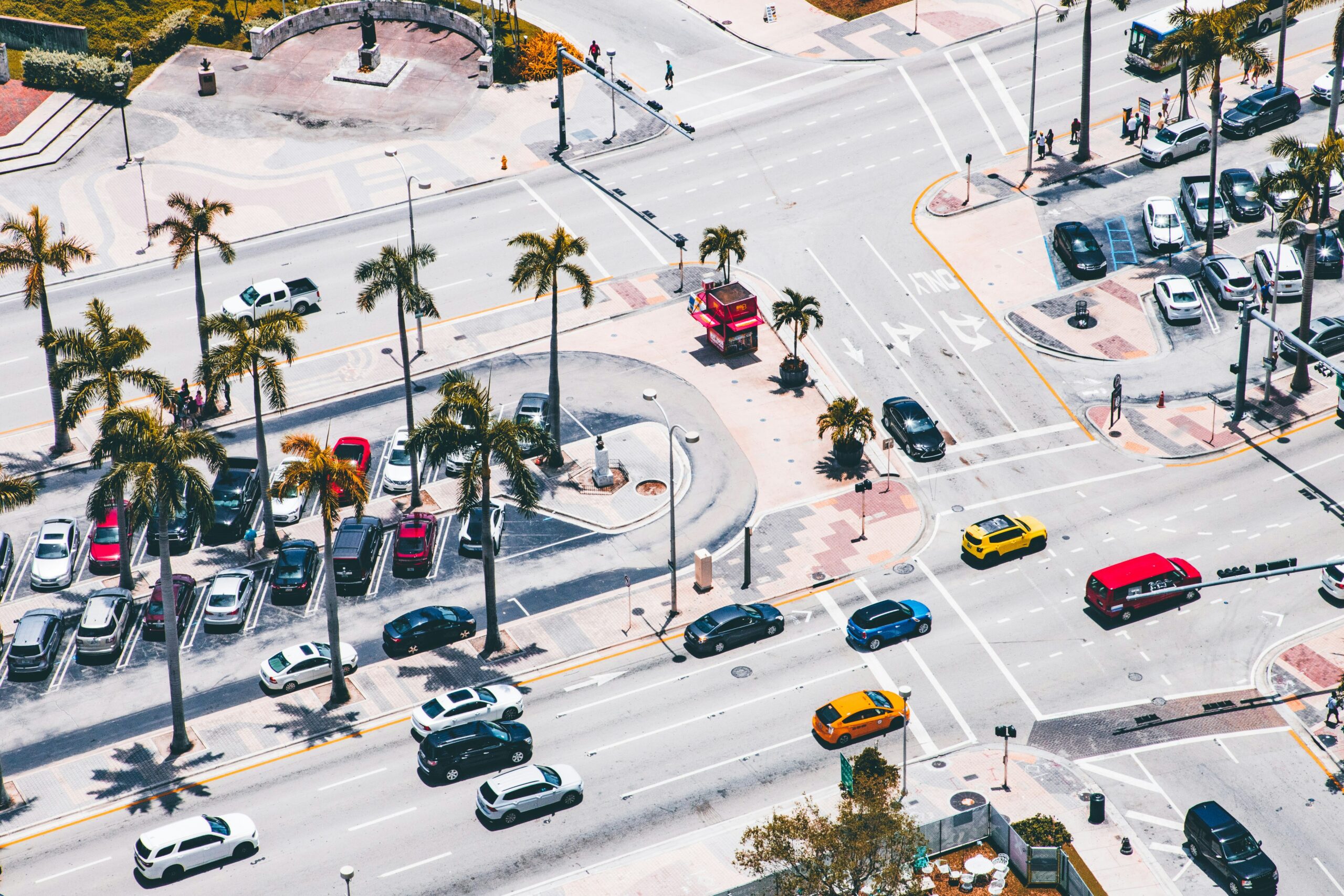 A aerial view of a street with cars and palm trees - tires near me (Best Tires Near Me in Miami)